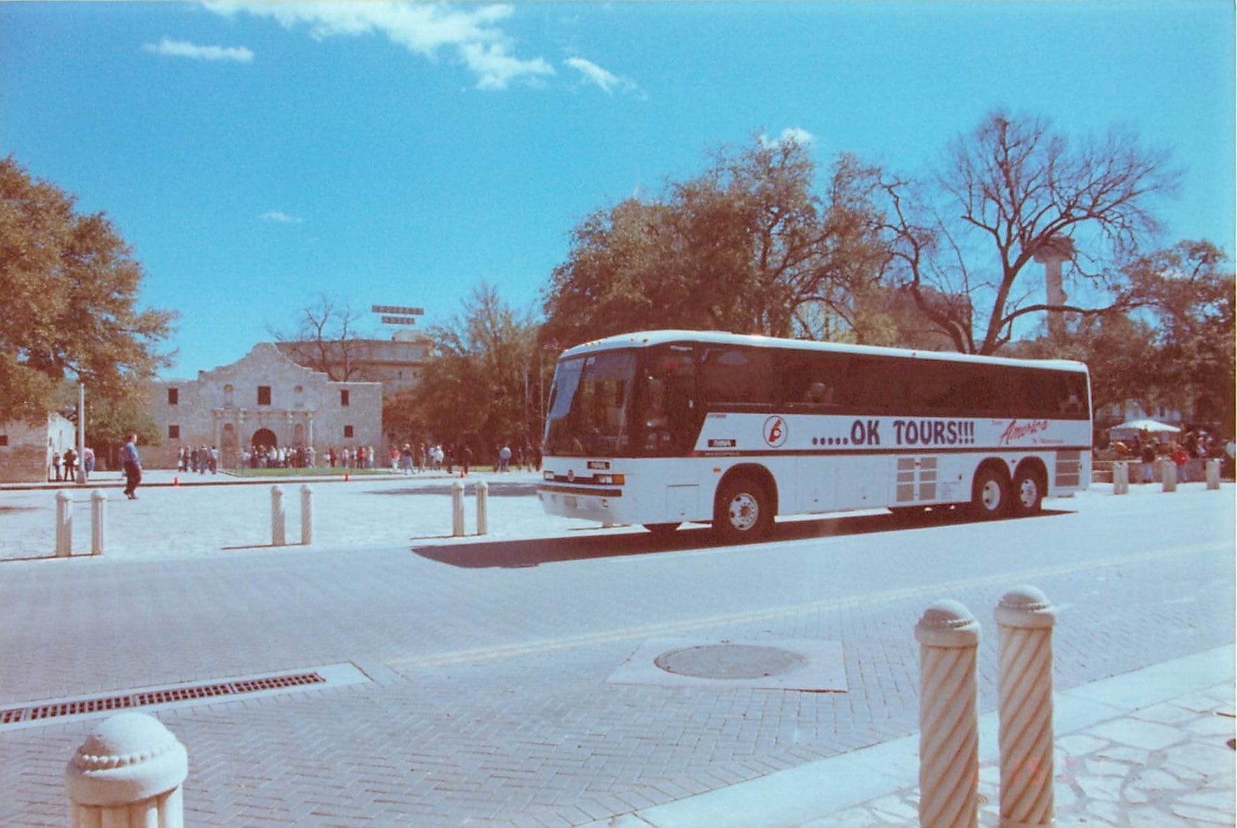 A bus driving down a street.