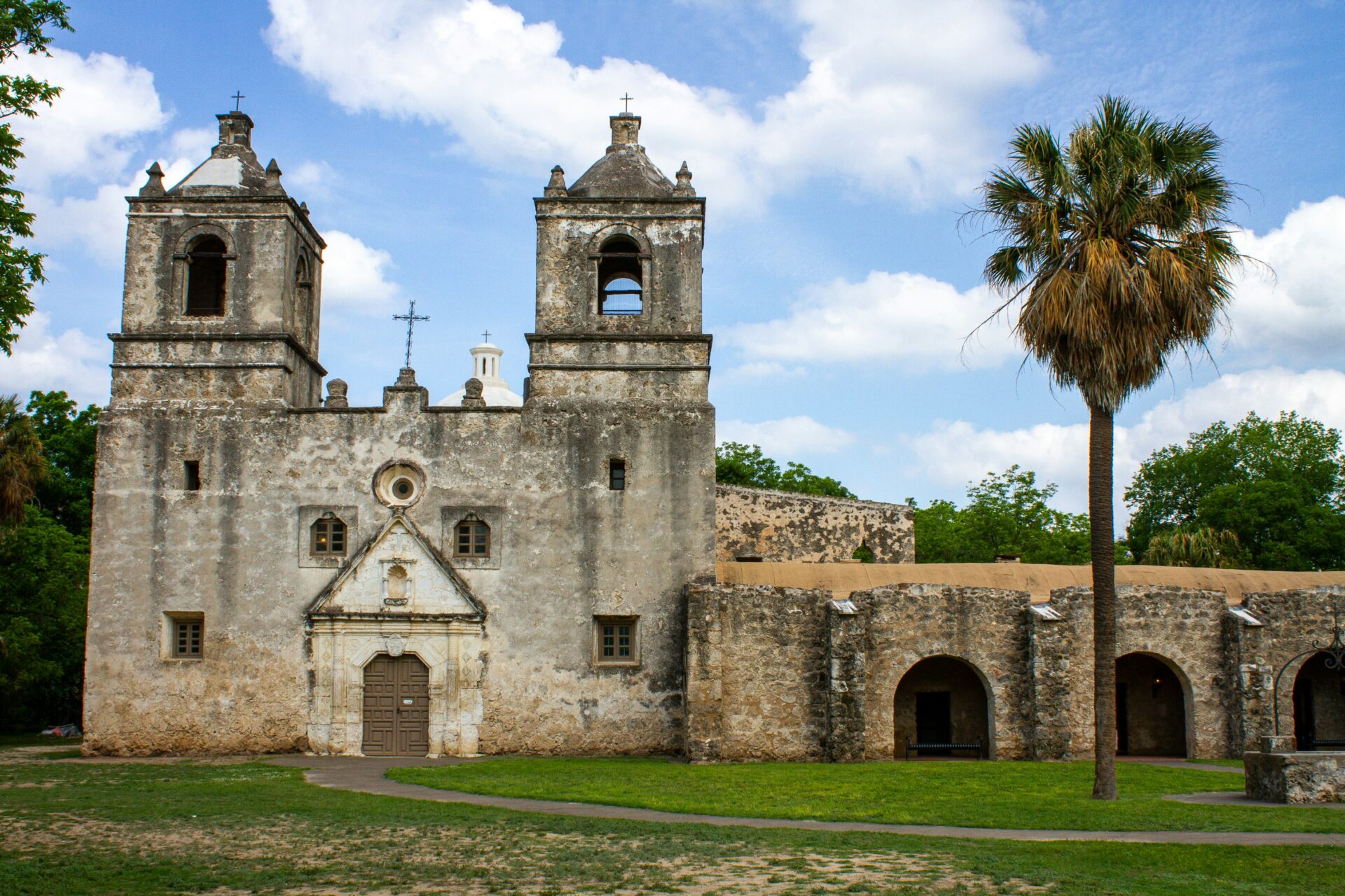 A stone building with two towers.